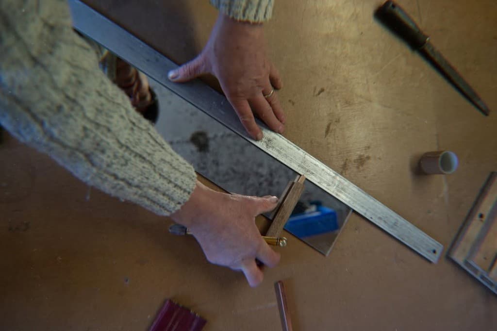 Anthony cutting glass for a commissioned piece
