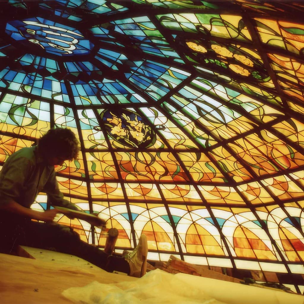 Anthony McCarty installing stained glass dome, Riyadh, 1983